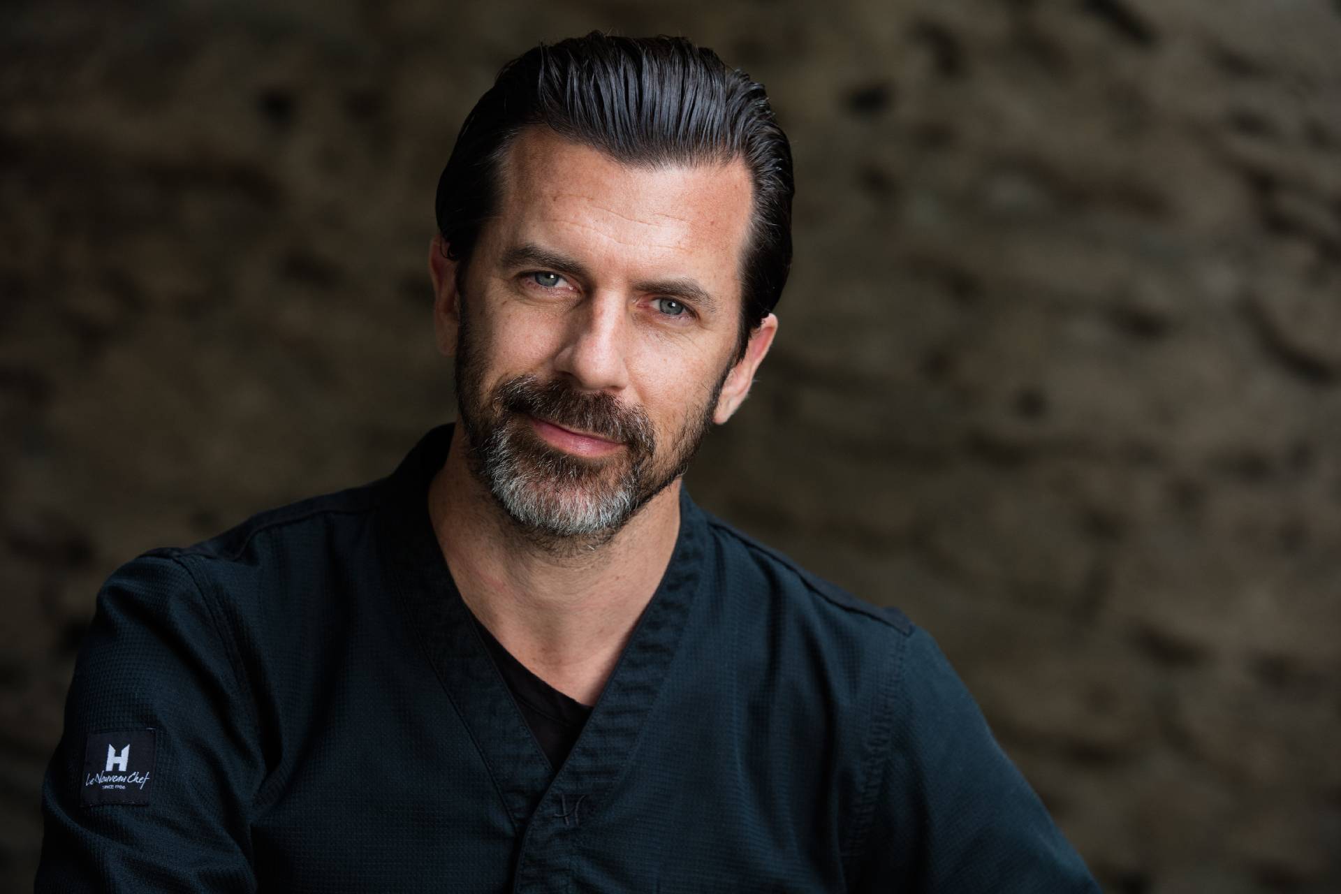 A close up of Chef Andreas Caminada