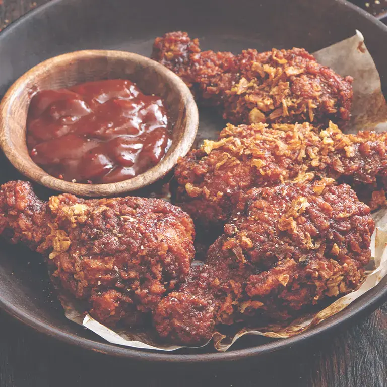 Alitas de pollo con salsa harissa