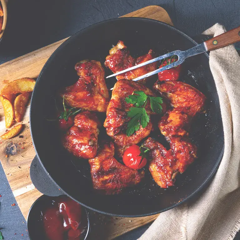 Alitas picantes de pollo en adobo