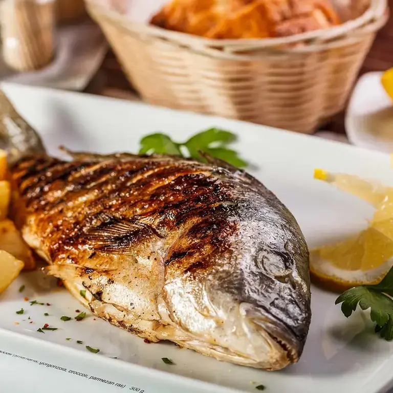 Besugo al horno con patatas  - Fine Dining Lovers